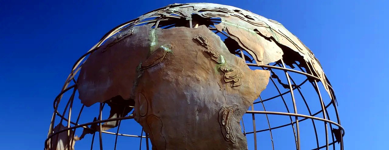 Original Astron globe identity visual